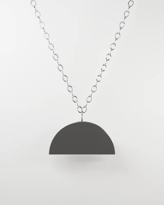 Half-moon pendant on a silver chain
